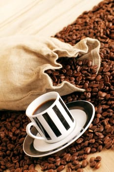 Coffee cup with coffee beans