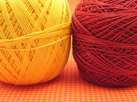 Wool ball on checkered background