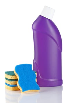 Plastic detergent bottle and sponges