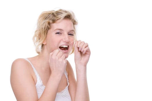Young woman with dental floss