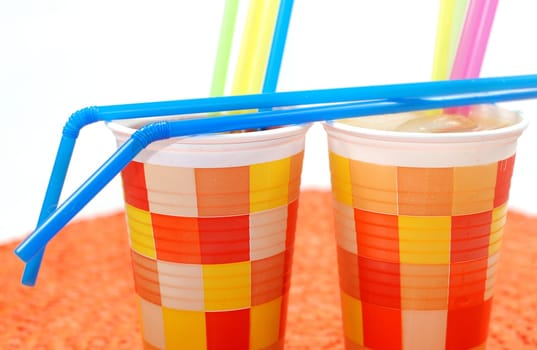 Paper cups with drinking straws