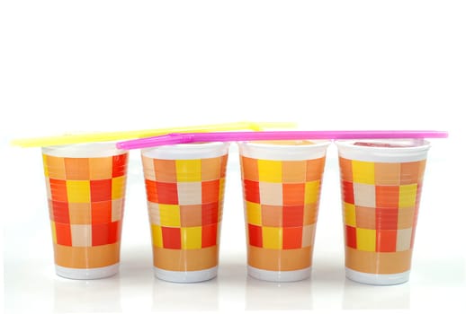 Paper cups with drinking straws