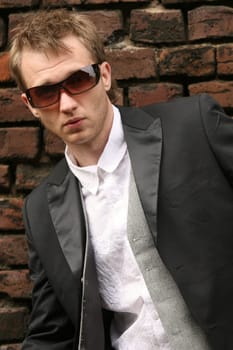 fashion man at the wall