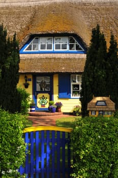 Thatched-roof house on the Baltic Sea