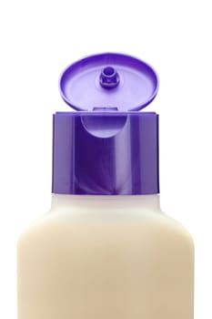 Opened plastic bottle with soap or shampoo