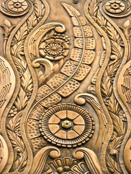 Floral pattern etched in brass