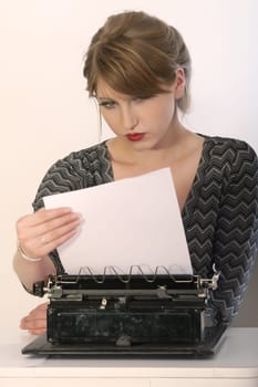 reading letter on typewriter