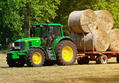 green tractor at work