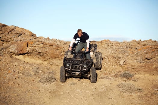 teen on quad ATV
