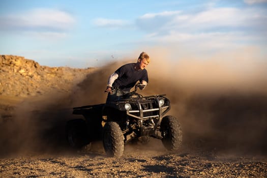 riding ATV - teen on quad