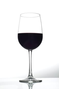 one wine glass with red wine