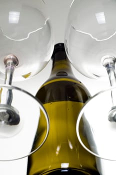 Empty wine glass and bottle