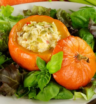Baked golden nugget pumpkin with rice stuffing ready to serve.