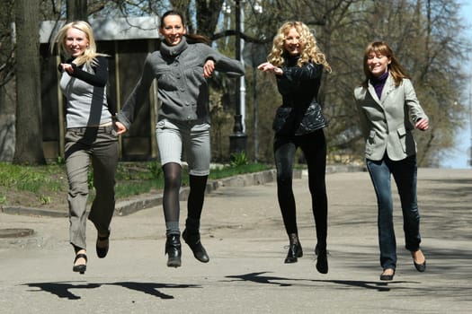 group of girls jumping