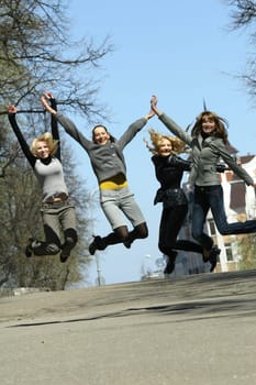group of girls jumping