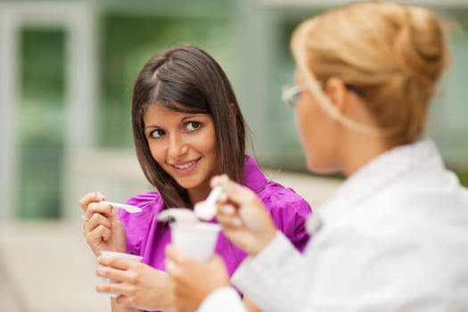 businesswomen drinking coffee