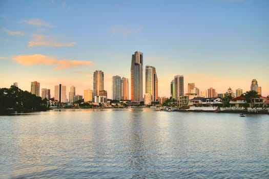 View of Surfers Paradise skyline from the Council Chambers at Bundall in the pink light before sunset.