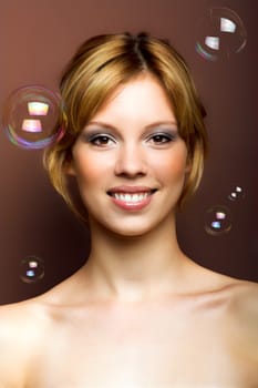 Woman with soap bubbles