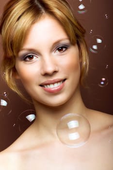 Woman with soap bubbles