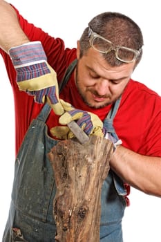 man sculptor and his wood