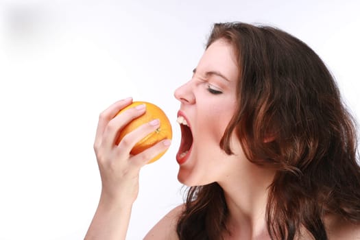 Beautiful Woman Biting An Orange