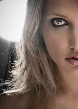 Half Face Portrait Of A Beautiful Blond Woman