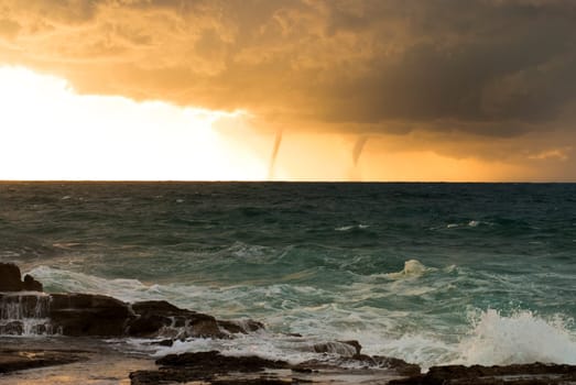 Storm with tornados on sea