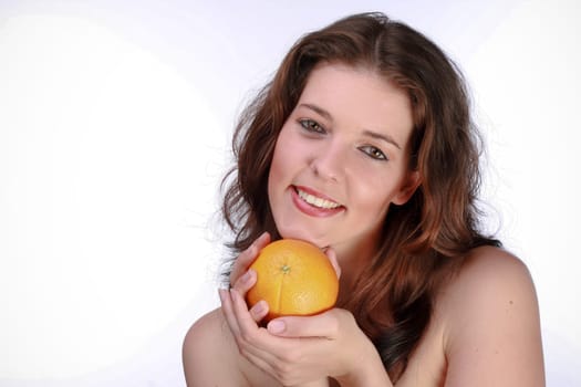 Beautiful Woman Holding An Orange