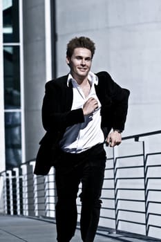 Young Man In Corporate Attire Running