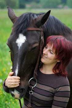 Young woman with horse