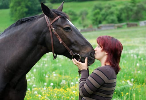 Young woman with horse