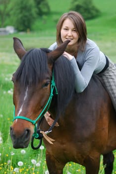 Young woman with horse