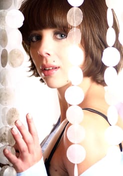 Girl behind curtain