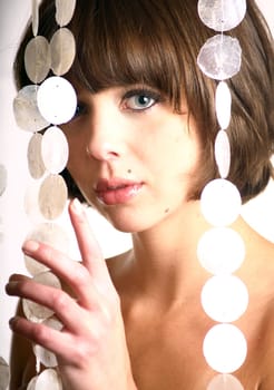 Girl behind curtain