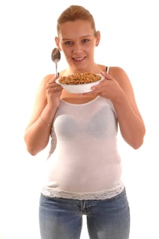 Smiling woman with cereal.