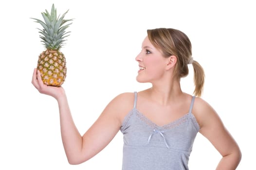 Young woman with pineapple