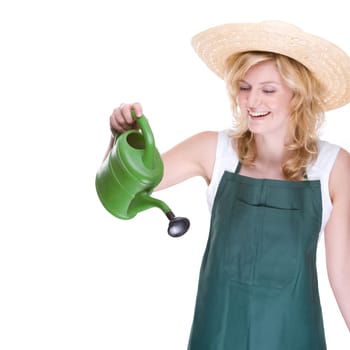Young gardener with watering can