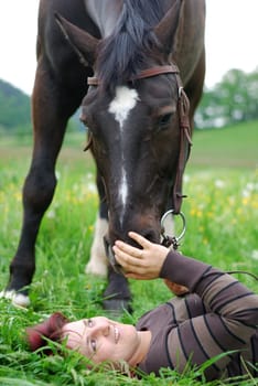 Young woman with horse