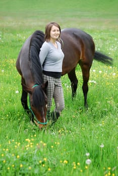 Young woman with horse