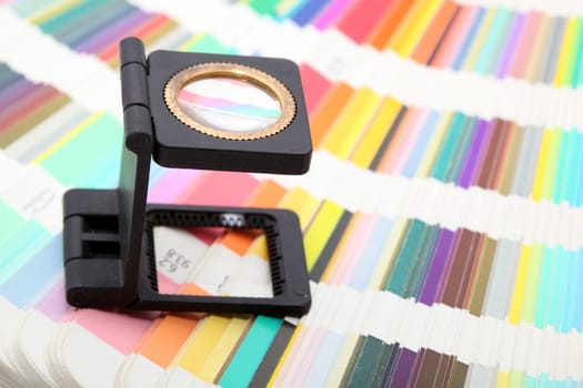 magnifying glass on colors