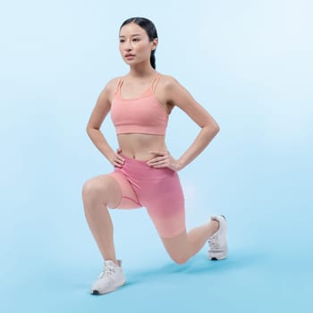 Young attractive asian woman in sportswear stretching before fitness exercise routine. Healthy body care workout with athletic woman warming up on studio shot isolated background. Vigorous