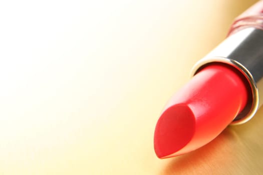lipstick on gold background
