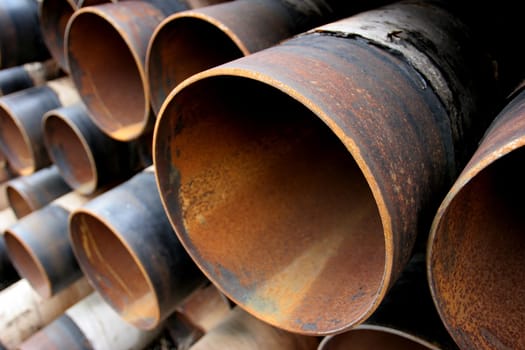 large rusting steel pipes
