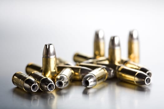bullets closeup on cold brushed metal