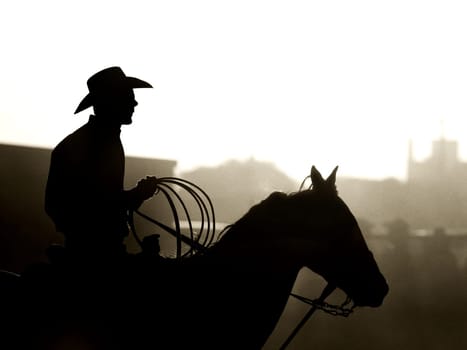 cowboy at rodeo - slight grain