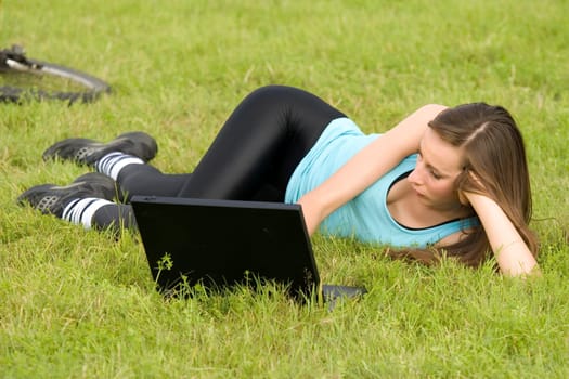 Woman with laptop outdoor