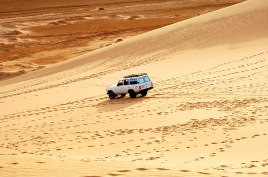 Dune bashing in the sand dunes of the Sahara
