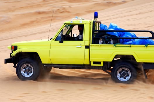 Dune bashing in the sand dunes of the Sahara