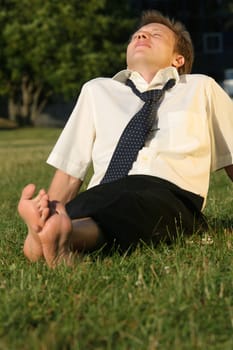 businessman relaxing in park