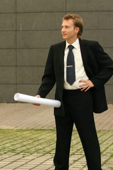architect with blueprint